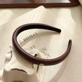 Minimalist dark brown PU leather headband with a small metallic logo accent - Wine Red with Gold Love Tag