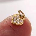 Golden heart pendant with paved clear stones and 5mm width measurement on fingertip - 5mm / Full Zircon Mini Heart