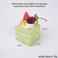 Jouet squishy gâteau mousse carré vert avec décor de fraises et de mangues - Vert