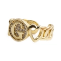 Detail of gold-plated open ring featuring a G-letter charm and hollow heart shape - Letter G