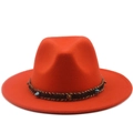 Close-up of orange wool fedora with a turquoise bead and woven decorative band - Orange
