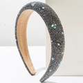 Detail of a thick sponge headband with gray rhinestones and rainbow star crystals - Gray