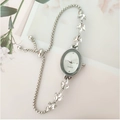 Macro shot of silver wheat leaf rhinestone watch with adjustable pull chain band - Silver