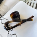 Close-up of tortoise shell hair claw clip with glossy finish on a minimalist magazine - Butterfly Buckle Ribbon (Approx 12cm) / Glossy Light Tortoise