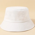 Minimalist plain white cotton bucket hat with a seamless brim and clean texture - White