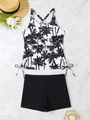 Flat lay of palm tree print tankini with drawstring sides and black boyshorts - S / Black