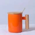 Orange ceramic mug with wooden handle, wooden lid and gold spoon set in minimal style - Cylindrical Orange Mug with Lid & Spoon