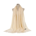 Detailed view of cream-colored cashmere scarf with soft woven texture and fringe trim - Creamy White