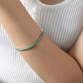 Elegantes Tennisarmband mit grünen Zirkonia-Steinen in silberner Titanfassung für Damen - Grüner Zirkon Stahl
