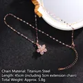 Rose gold rotating four-leaf clover necklace with cubic zirconia in titanium steel - Rotating Style 4/Clear Zirconia Flower