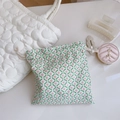 Detailed close-up of pink floral drawstring storage pouch with cotton texture and beige ropes - Green Leaf Pink Small Flower