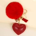 Portachiavi con pompon rosso, cuore di strass, nappa e moschettone dorato elegante - Rosso