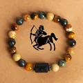 Natural tiger eye stone beaded Sagittarius zodiac bracelet on rustic textured card - Sagittarius