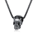 Classic minimalist black stainless steel skull pendant necklace with link chain on white background - Skull Head Black + Plated Chain