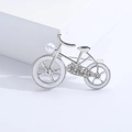 Silver bicycle brooch with white pearl accent and shimmering rhinestones - Silver White