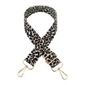 Adjustable leopard print bag strap with golden metal hooks on a white background - Beige Black Leopard Gold Thread + Gold Buckle