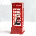 Christmas lantern ornament featuring a red telephone booth with Santa Claus and snow inside - Telephone Box Interior Santa Claus