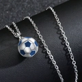 Detail of silver and blue soccer ball pendant on a stainless steel chain over dark leather - O-Chain Soccer / Blue