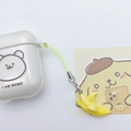 Durchsichtige AirPods-Hülle mit Bären-Design und einem niedlichen gelben Bananenanhänger - Mit Kopfhörerhülle / Banane