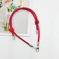 Detail of red leather woven strap with silver metal clasps for DIY bags and phones - Wine Red + Red