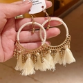 Bohemian gold hoop earrings with cream woven rope and hanging cotton tassels - Round Cotton Tassel Style (HE21220)