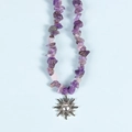 Irregular purple amethyst beaded necklace featuring a vintage silver sun charm - Amethyst Sun