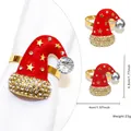 Golden Christmas hat napkin ring with red enamel and crystals on white cloth - Christmas Hat Style 40