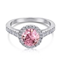 Macro view of polished silver ring featuring a pink halo gemstone and side accents - US 8 / Round Pink Halo Zirconia