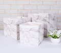 Three-piece marble pattern kraft paper gift bag set with cutout oval handles - White Marble Pattern