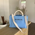 Light blue woven straw tote bag with black PARIS embroidery and long shoulder strap - Large Blue
