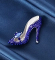 Elegant silver high heel brooch with sparkling blue rhinestones on blue silk background - High Heels (Blue)