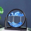Circular blue and white moving sand art with black frame and base for desk decor - 8 Inch Stand Blue