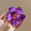 Elegant purple hibiscus flower hair clip with realistic yellow and red stamens detail - Purple Hibiscus Hair Clip
