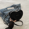 Chic black heart-shaped crossbody bag with gold fashion lettering and adjustable strap - Black