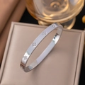 Silver four-leaf clover diamond titanium steel bangle on champagne gift box - Silver