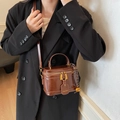 Brown leather box bag with a top handle and adjustable shoulder strap for women - Brown with Pendant