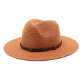 Close-up of woven straw fedora featuring a brown leather band and metal rivets - M (56-58cm) / Caramel color