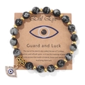 Evil Eye beaded bracelet with snowflake obsidian natural stone and gold accent charms - 19cm / Snowflake