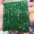 Perle rettangolari in pietra naturale verde scuro 2x4mm tenute in mano per gioielli - Giada Malese