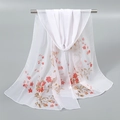 Detail of sheer chiffon floral scarf featuring elegant red blossoms and golden leaves - White (Fresh Ditsy)