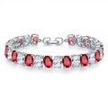 Detail view of silver tennis bracelet with ruby-red and white oval-cut crystals - Platinum Red Zirconia (068)