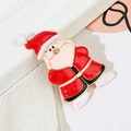 Close-up of Santa Claus enamel brooch with gold trim for festive Christmas apparel - Santa Claus
