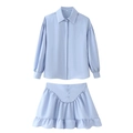 Flat lay of light blue long-sleeved shirt and ruffled mini skirt two-piece set in size S - Light Blue
