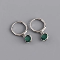 Close-up of S925 sterling silver hoop earrings with round emerald green zircon drops - 925 Silver / Emerald Green (Silver)
