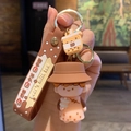 Portachiavi orsetto bubble tea marrone con cinturino in silicone e piccolo ciondolo tazza - Ragazzo del tè al latte