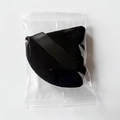 Single black triangular velvet makeup sponge with silk ribbon in clear packaging - Candy Bag Packaging / Black