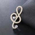 Luxury golden G-clef musical note brooch inlaid with sparkling rhinestones on black leather - Treble Clef Gold (XD9422-2)