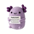 Handmade purple crochet positive axolotl doll holding an encouraging mini card - Axolotl Purple P Card