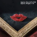Detail of red rhinestone lips brooch on golden base with vintage baroque aesthetic style - Rhinestone Red Lips