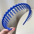 Matte royal blue wavy headband with non-slip teeth for secure hair styling - Blue